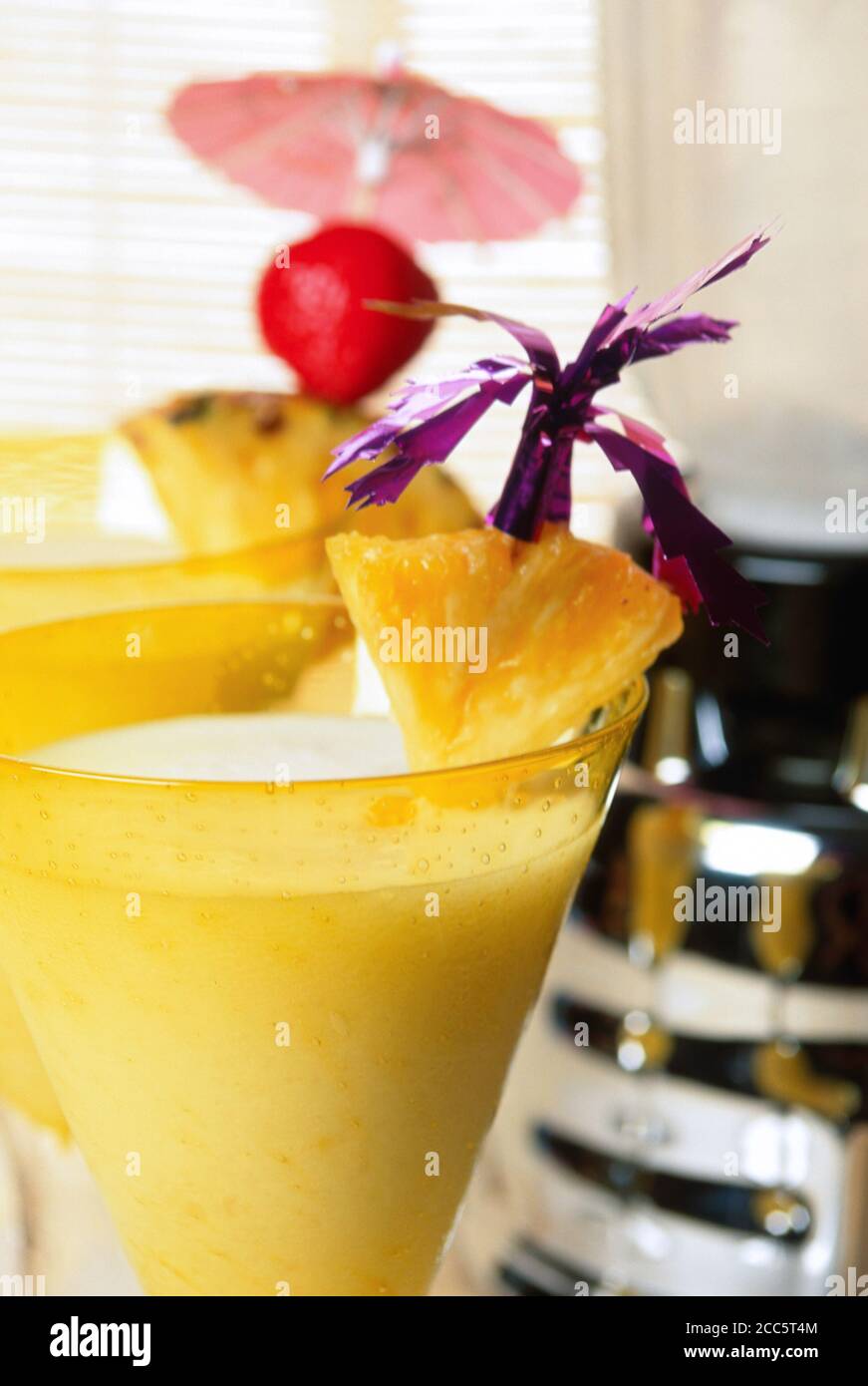 Tropical alcoholic Drinks feature Fruit Garnishes Stock Photo Alamy