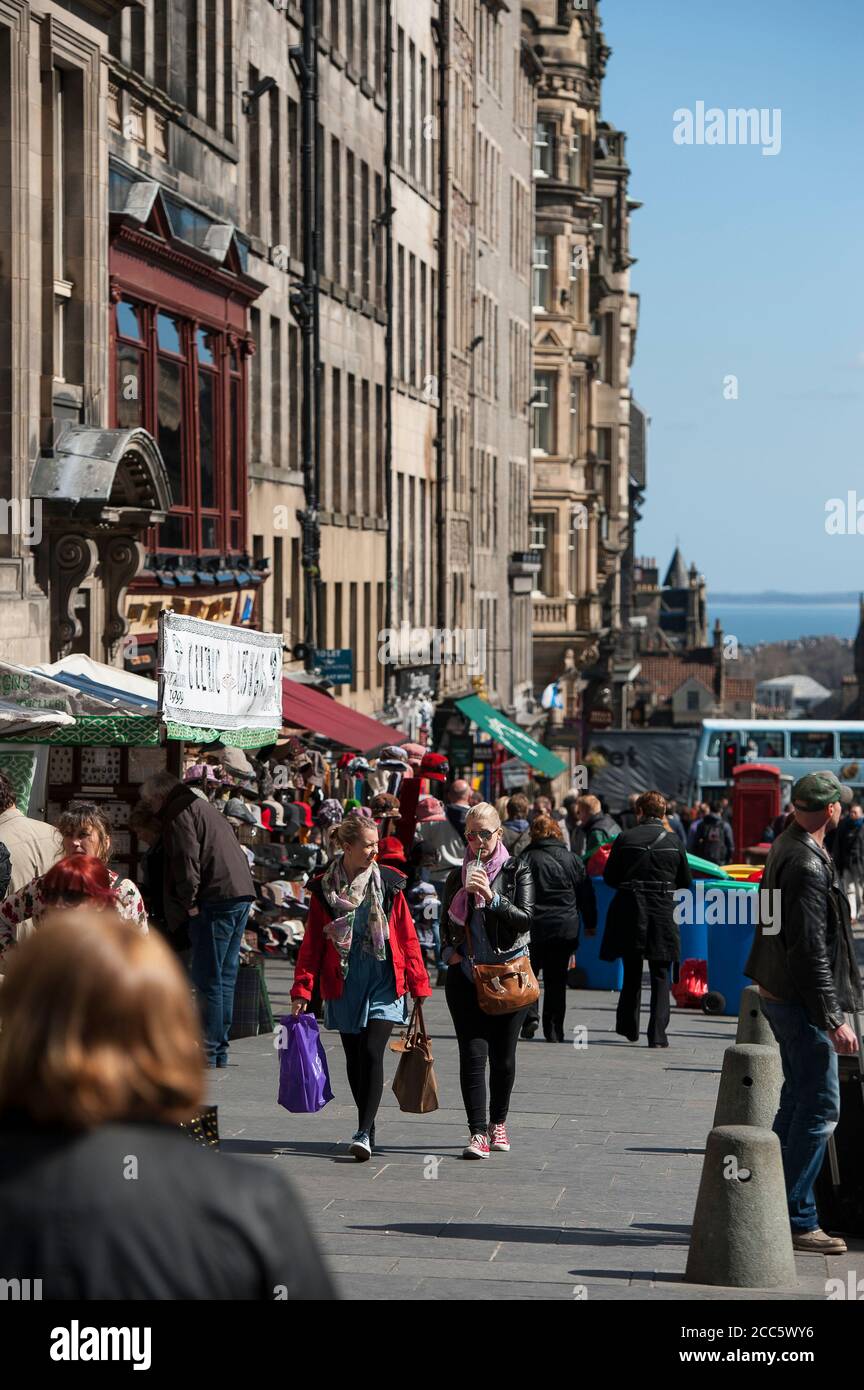 People shopping on Lawnmarket in the city of Edinburgh, Scotland. Stock Photo