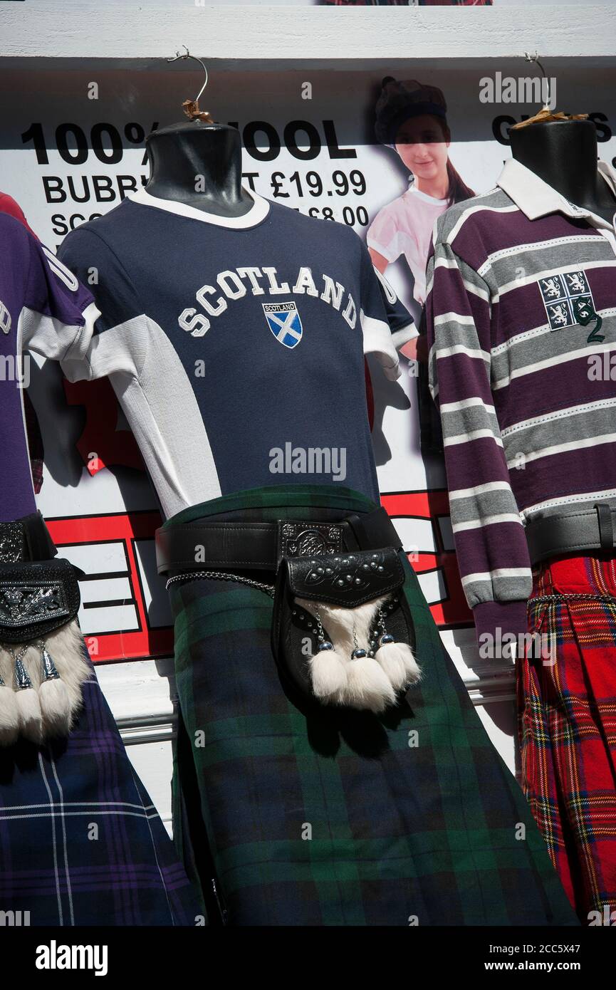 Tshirts and tartan kilts for sale at a gift shop on the Royal Mile in