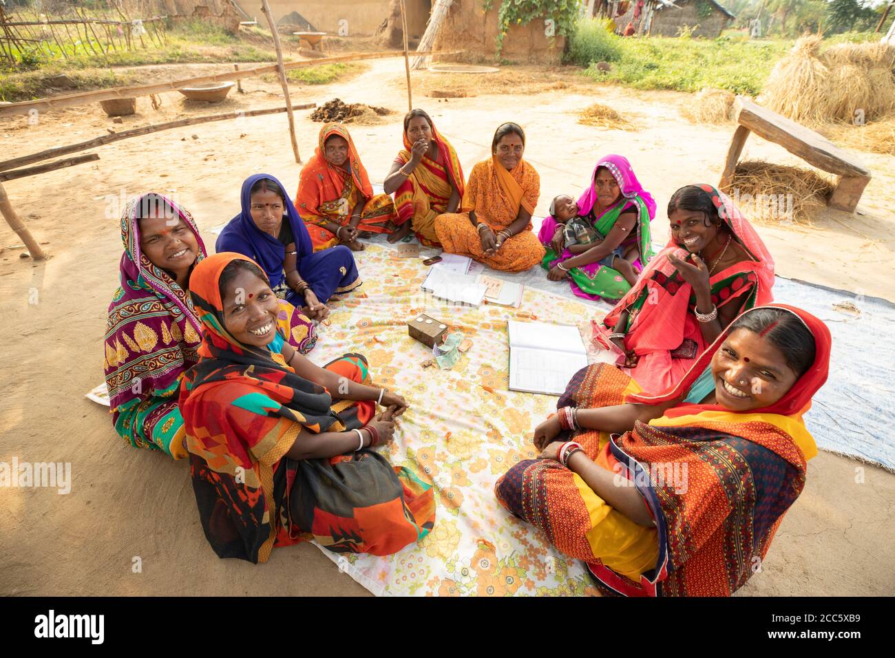 Women save and lend amongst each other in a village savings and loan