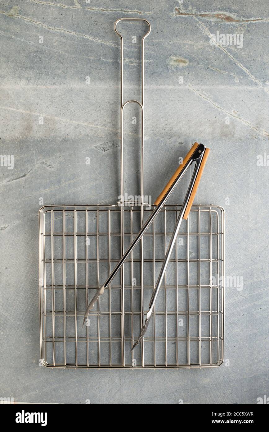 BBQ Grid and Tongs Stock Photo Alamy