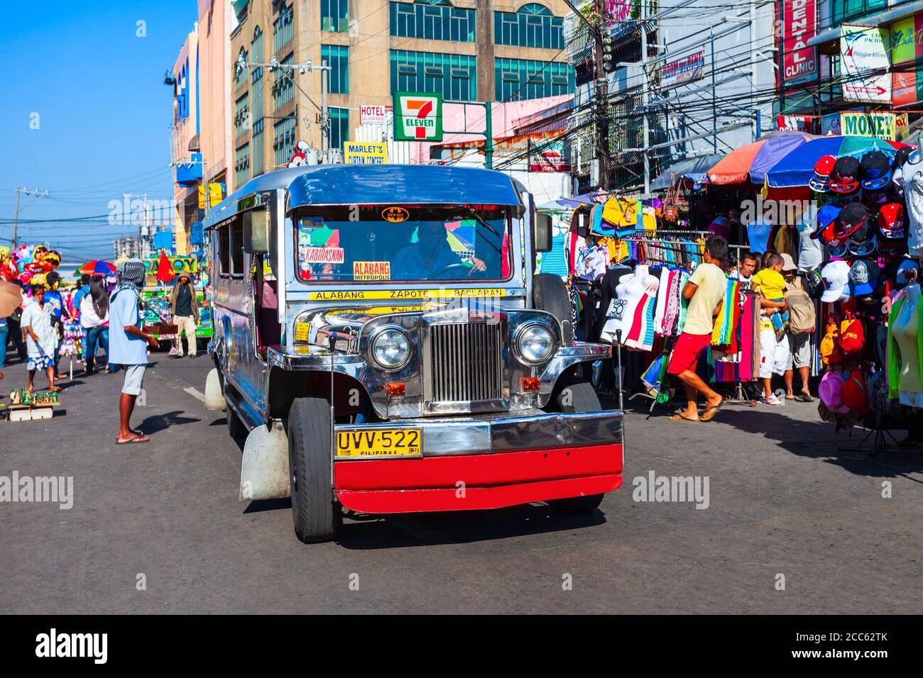 MANILA, PHILIPPINES - MARCH 17, 2013: Jeepneys are popular public transport in the Manila city in Philippines, they made from old US military jeeps Stock Photo