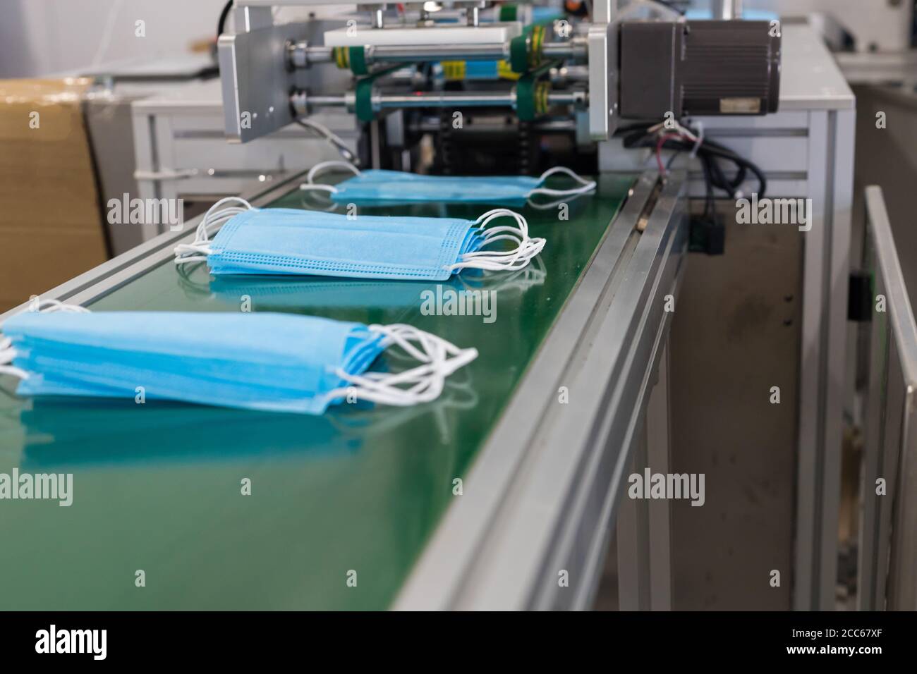 Medical disposable face masks production hi-res stock photography and ...