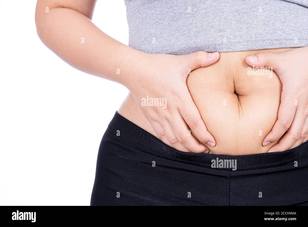 Woman grabbing skin on her flanks with the black color crosses marking,  Lose weight and liposuction cellulite removal concept, Isolated on white  backg Stock Photo - Alamy