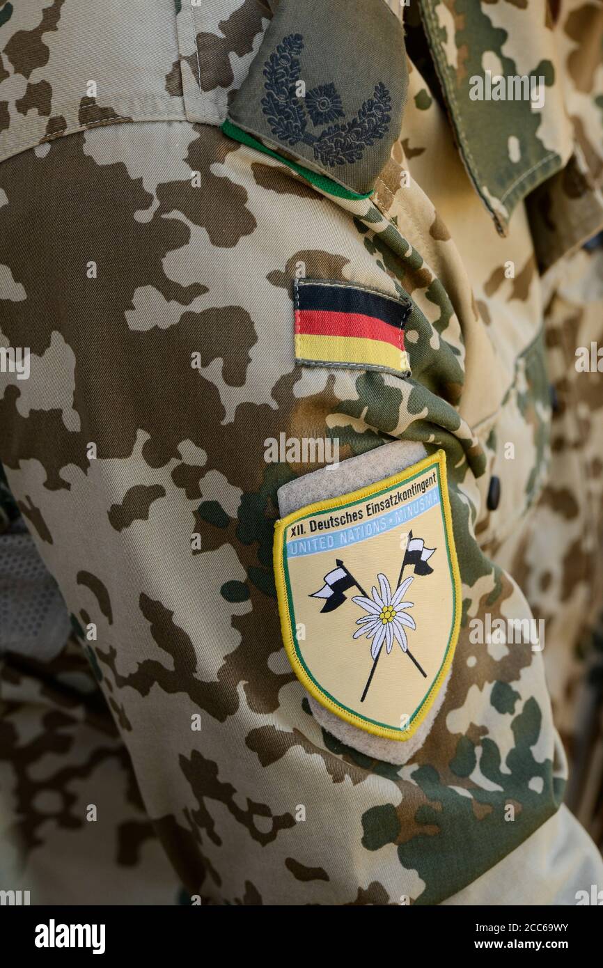 MALI, Gao, Minusma UN peace keeping mission, Camp Castor, german army Bundeswehr , camouflage uniform with german flag and UNITED NATIONS Minusma, United Nations Multidimensional Integrated Stabilization Mission in Mali, german troop contingent sticker Stock Photo