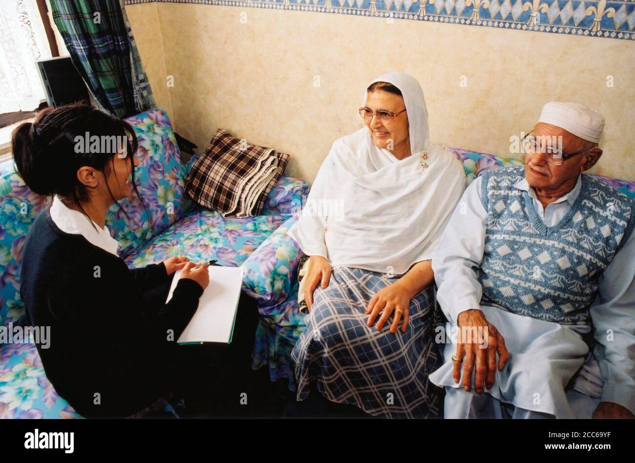 Housing officer with tenants UK Stock Photo Alamy