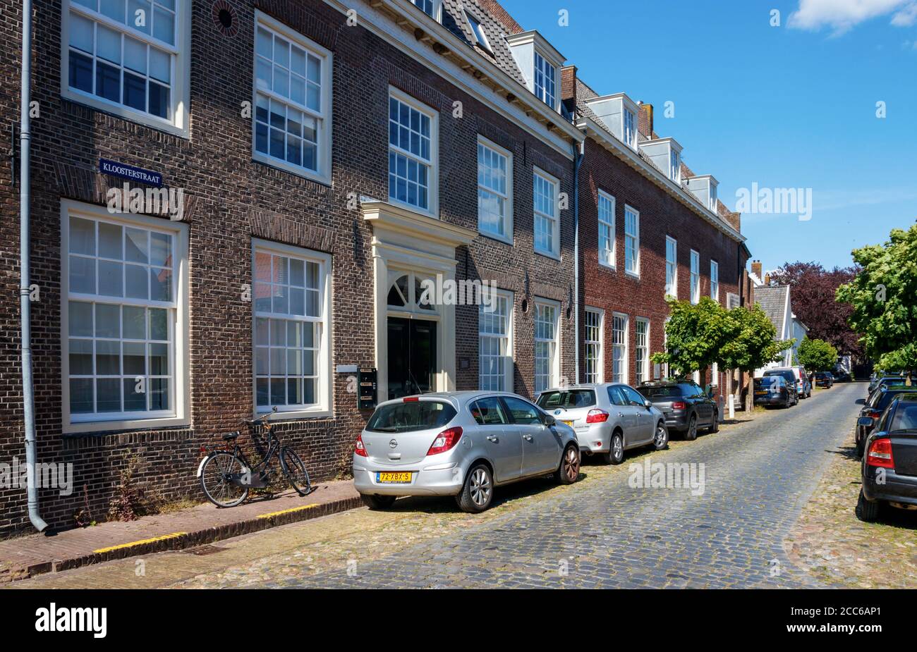 Naarden old city centre. Kloosterstraat with the Comenius Museum on a sunny day. North Holland, The Netherlands. Stock Photo