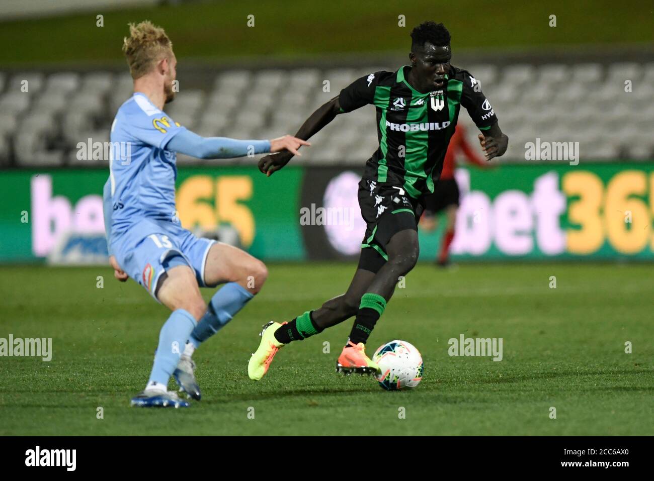 19th August 2020; Jubilee Oval, Sydney, New South Wales, Australia; A League Football, Western United FC versus Melbourne City FC; Kuach Yuel of Western United breaks past Nathaniel Atkinson of Melbourne City Stock Photo