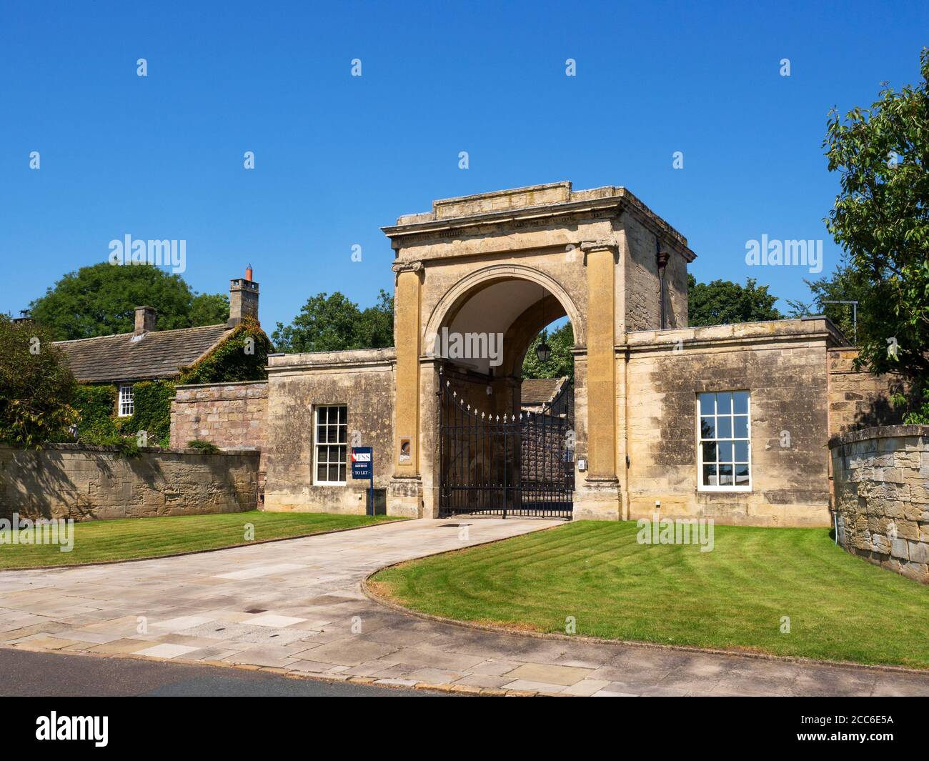 Rudding Gates former entrance to Rudding Park Estate in Follifoot near Harrogate North Yorkshire England Stock Photo