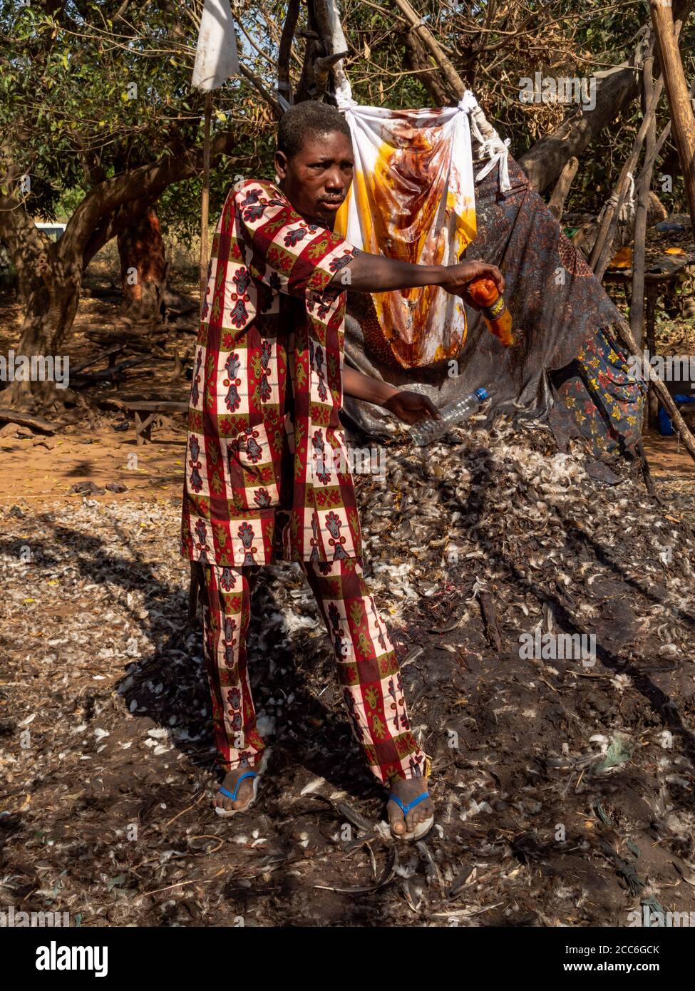 Dankoli/Benin - 01/01/2020 - Unidentified man does some rituals as a ...