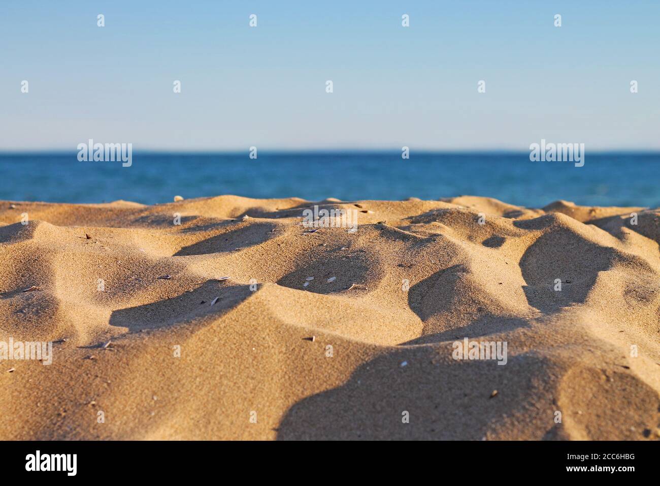 Tranquil empty sandy beach close up. Black sea coast. Stock Photo