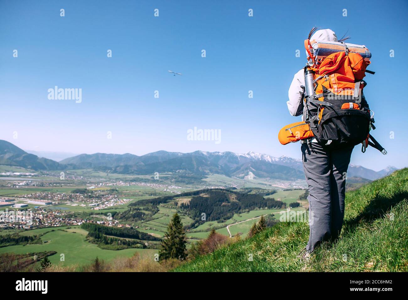 Happy active woman backpack hi-res stock photography and images - Alamy