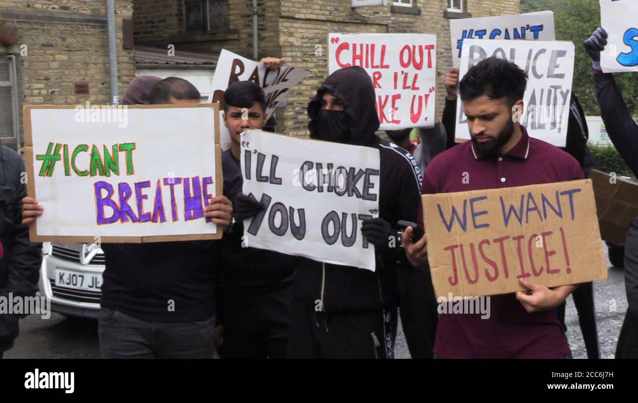 People with placards, gathered for a demonstration outside Halifax police station on Wednesday afternoon. A West Yorkshire officer has been suspended after a video was widely shared of Hassan Ahmed, 27, being arrested in Halifax on Sunday. Safyah is Hassan Ahmed's sister. Stock Photo