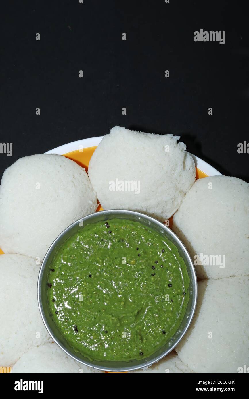 Idly with Coriander mint Chutney, South indian breakfasts Stock Photo