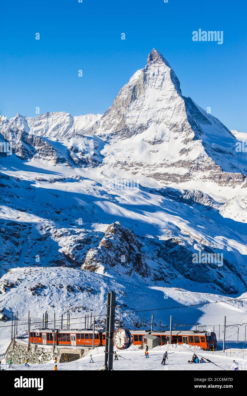 Zermatt, Switzerland - December 31, 2014 -The train of Gonergratbahn running to the Gornergrat station in the famous touristic place with clear view t Stock Photo