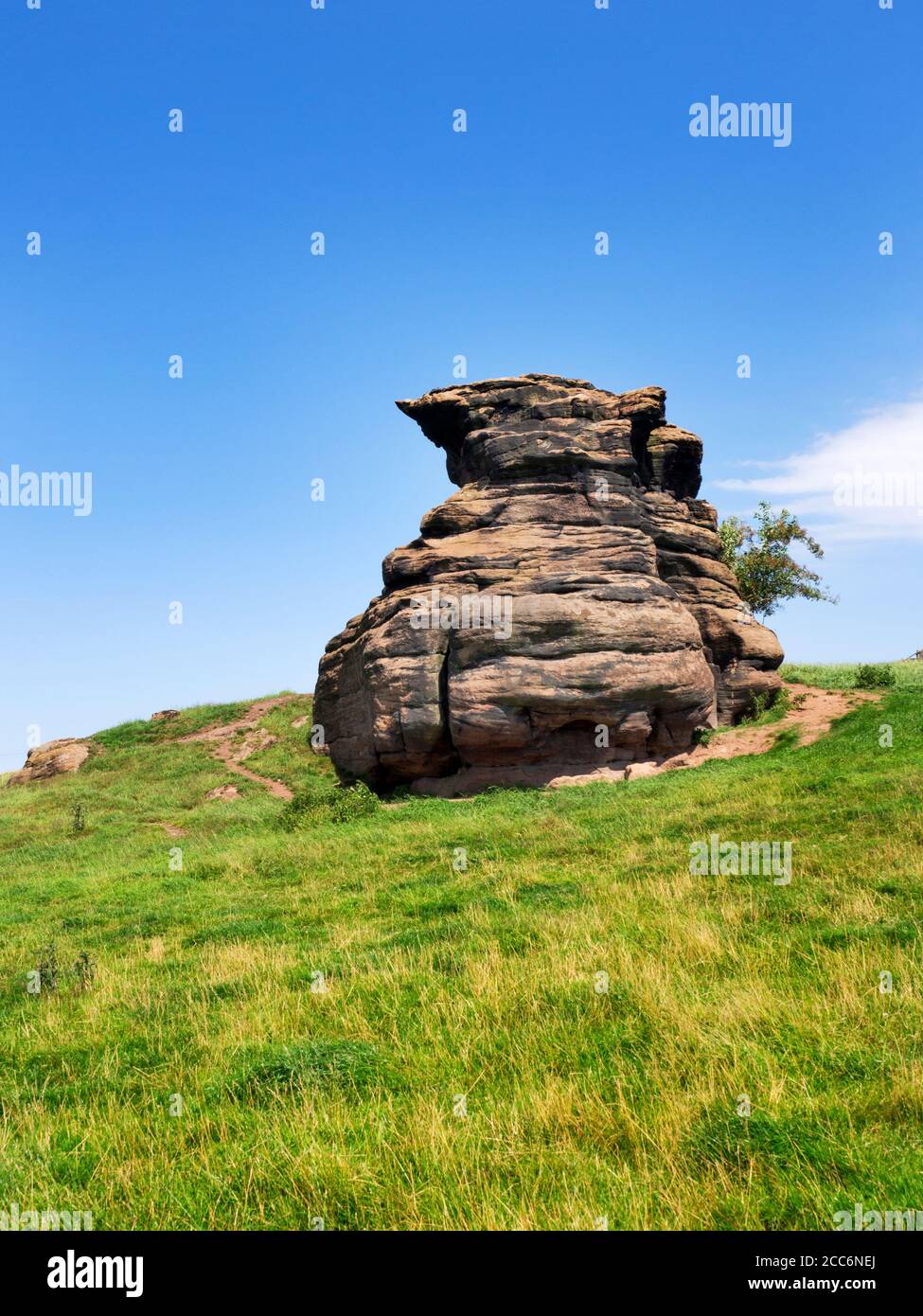 Gritstone rock formation in the Crimple Valley near Spofforth Harrogate North Yorkshire England Stock Photo