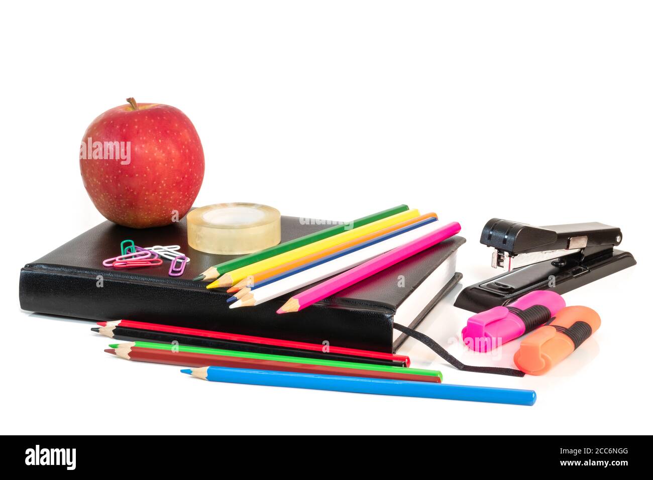 Back to school concept with colorful stationary over white background. Stock Photo