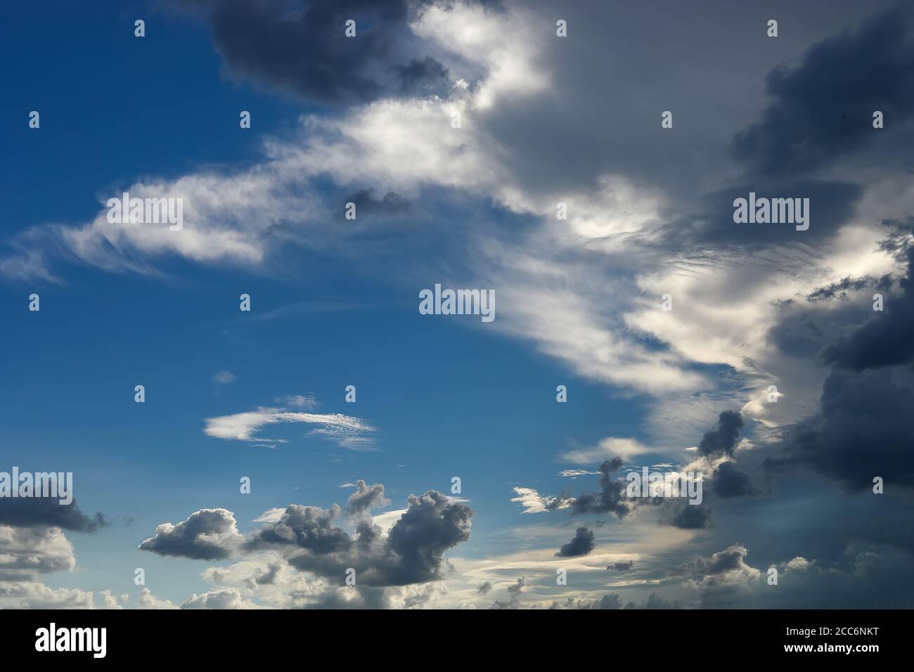 Black cloud and thunderstorm before rainy, Dramatic black cloud and dark sky Stock Photo
