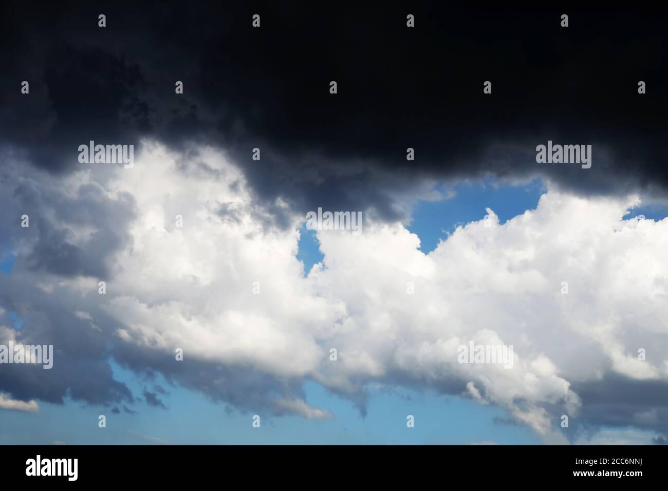 Black clouds formed before the rain, used to make a backgrounds image. Stock Photo