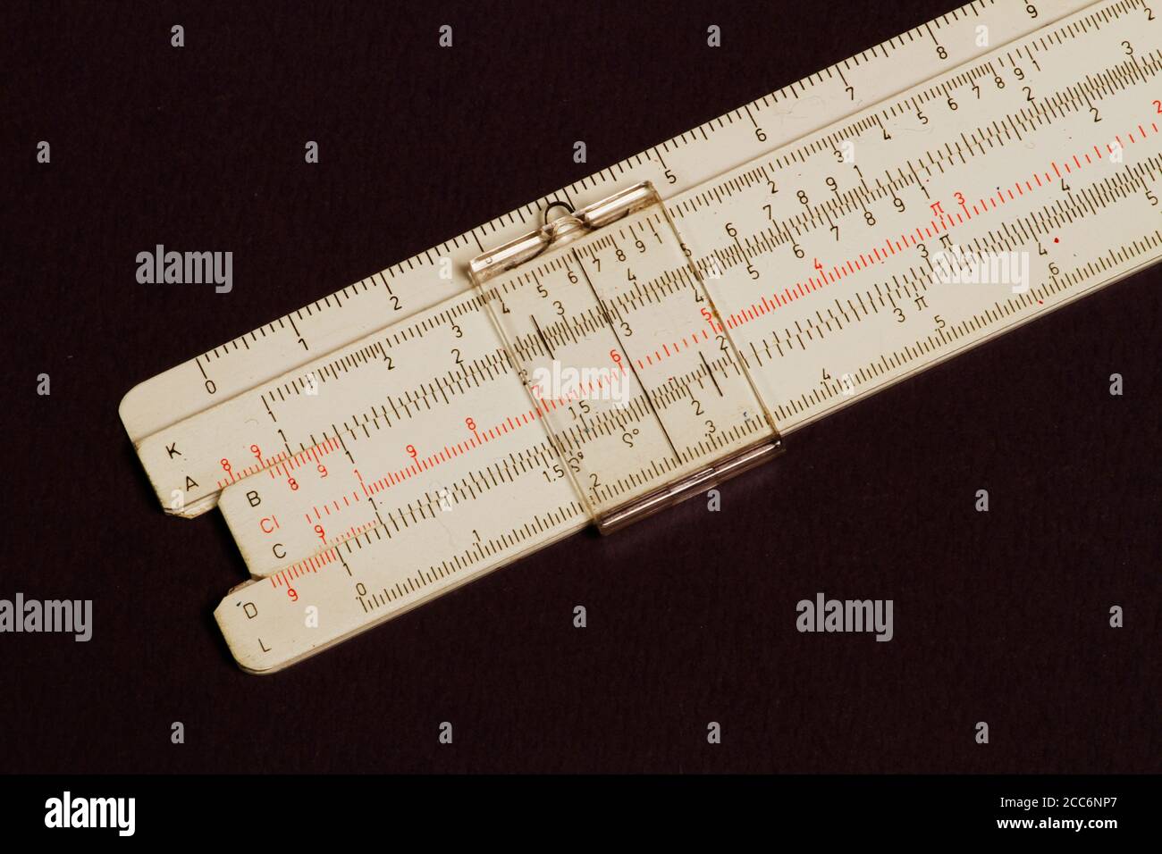 Logarithmic ruler on a colored background. Stationery for engineers and ...