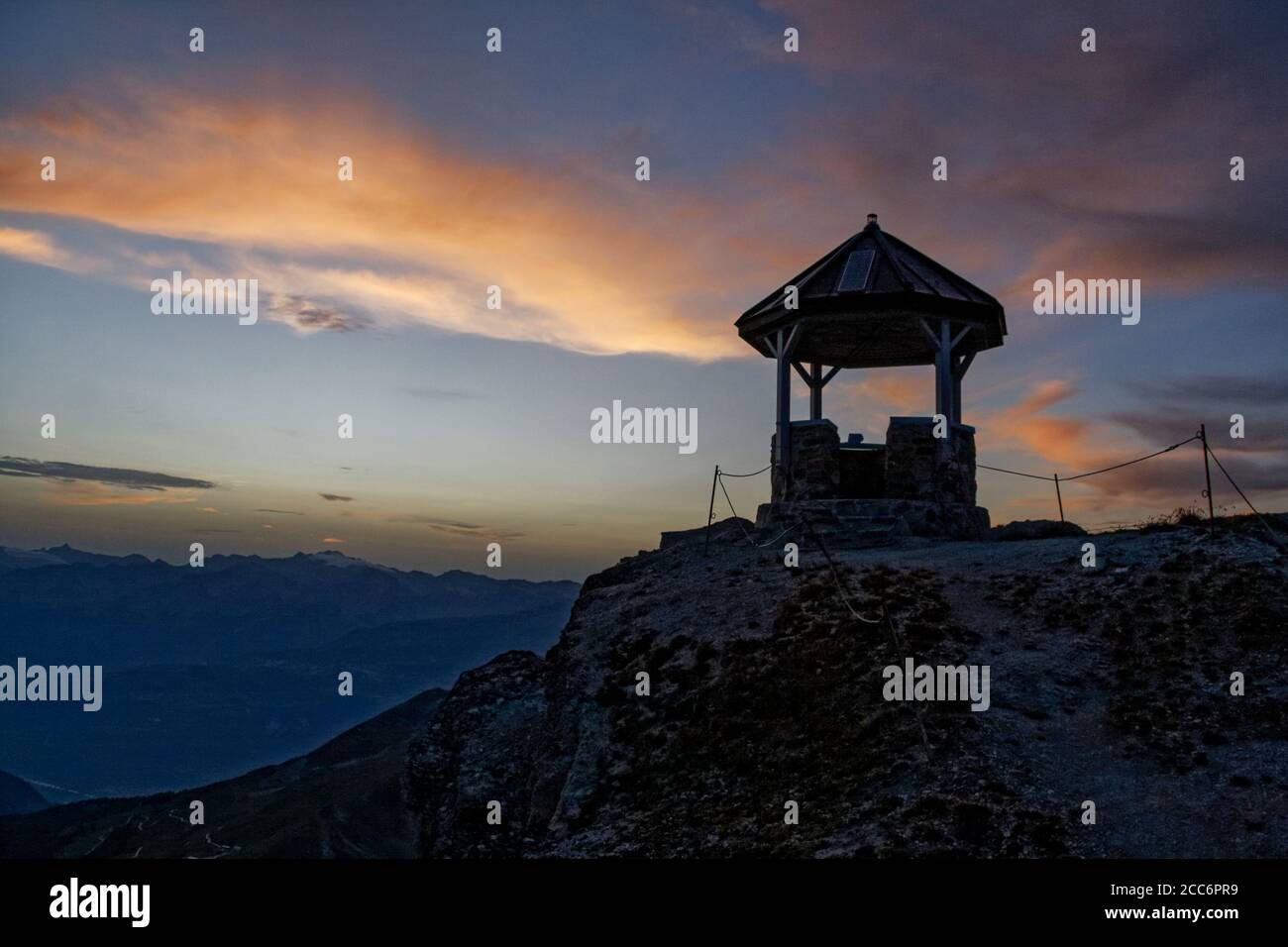 Pavilion on the summit of Rothorn in the late evening with view of the Rhine Valley, St Luc, Val d'Anniviers, Valais, Switzerland Stock Photo