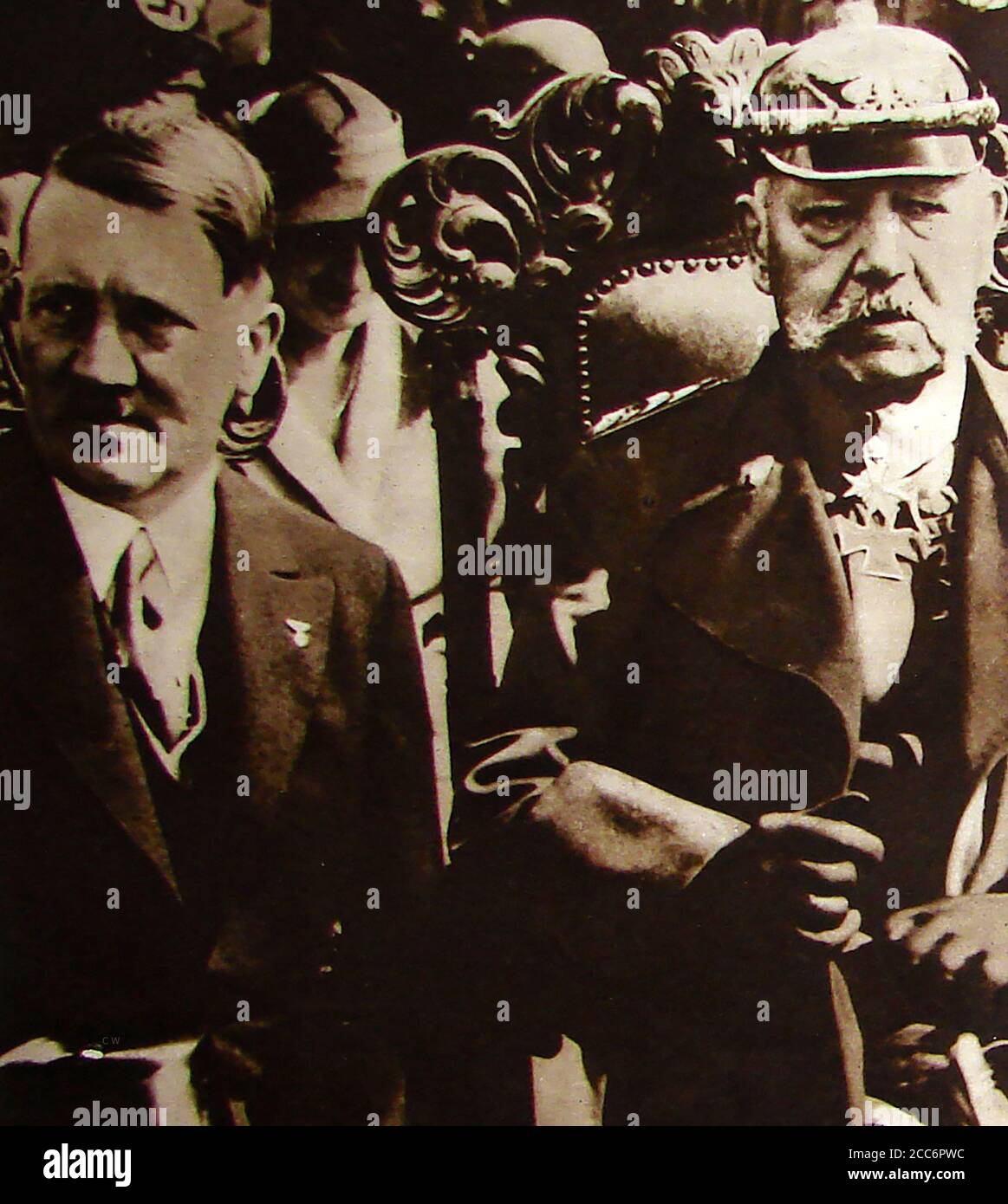 1933 Adolph Hitler and President Hindenburg together (Hindenburg died the following year and Hitler assumed office. Paul Ludwig Hans Anton von Beneckendorff und von Hindenburg, known more simply as Paul von Hindenburg   was  German  statesman who led the Imperial German Army as General during World War I. He later became   President of Germany (1925) until his death during the Weimar Republic when Hitler took over. It was he (under pressure) that appointed Hitler Chancellor of Germany. Stock Photo
