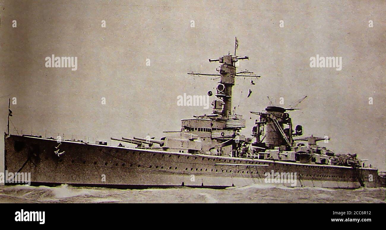 October 1934 image of the first of Germany's 'Pocket Battleships', the DEUTSCHLAND in the Firth of Forth, Scotland on training maneuvers and visiting Edinburgh on an official state visit. Its sister ships  were the Admiral Scheer and Admiral Graf Spee, a series of three Panzerschiffe (armored ships) or heavily armed cruisers, built by the Reichsmarine, officially in accordance with restrictions imposed by the Treaty of Versailles, though they violated the weight limit. They used welded construction and were propelled by diesel. Stock Photo