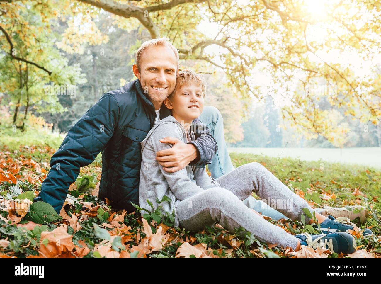 Father and son autumn portrait Stock Photo - Alamy
