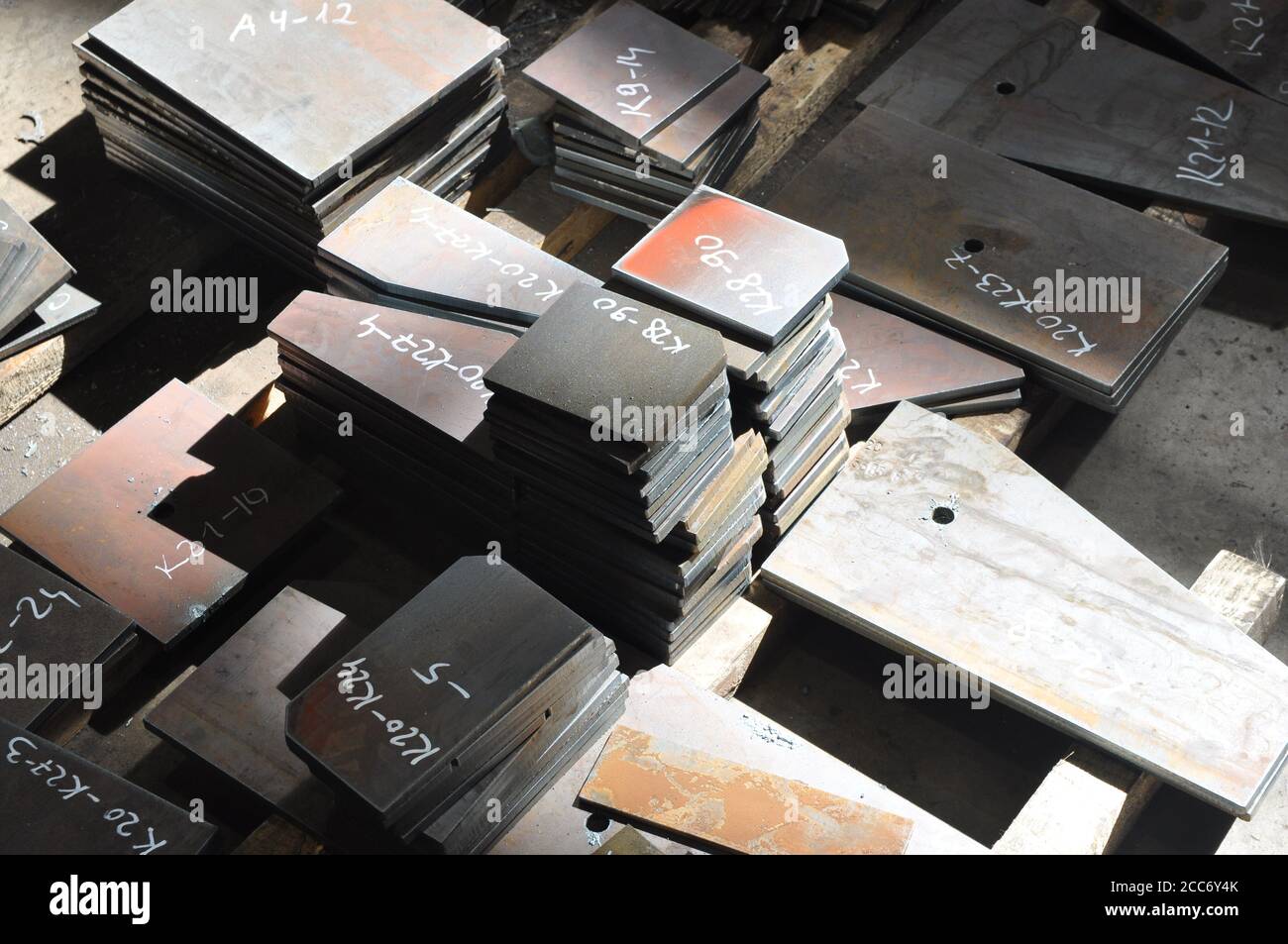 Metal cutting. Warehousing of finished parts with marking. Stock Photo