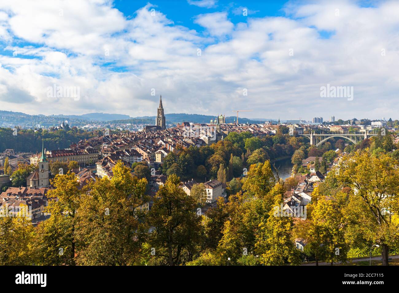 Stunning aerial panorama view of Bern old town with Bern Minster (Münster) cathedral and Aare river, Kornhausbrücke bridge, from Rosengarten on sunny Stock Photo