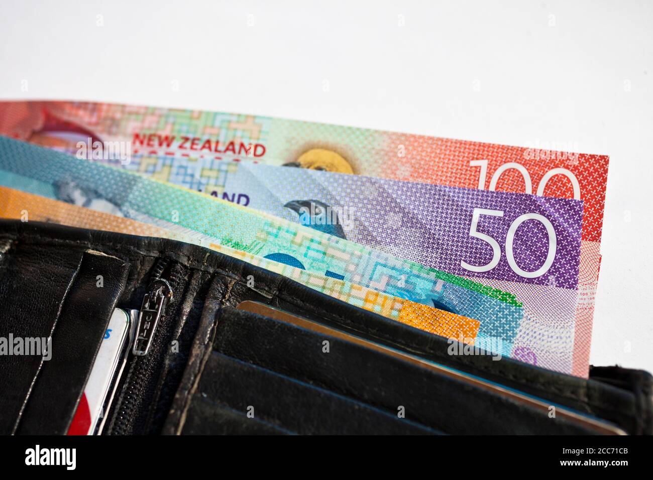 New Zealand cash, money or currency fanned out in someones wallet Stock Photo