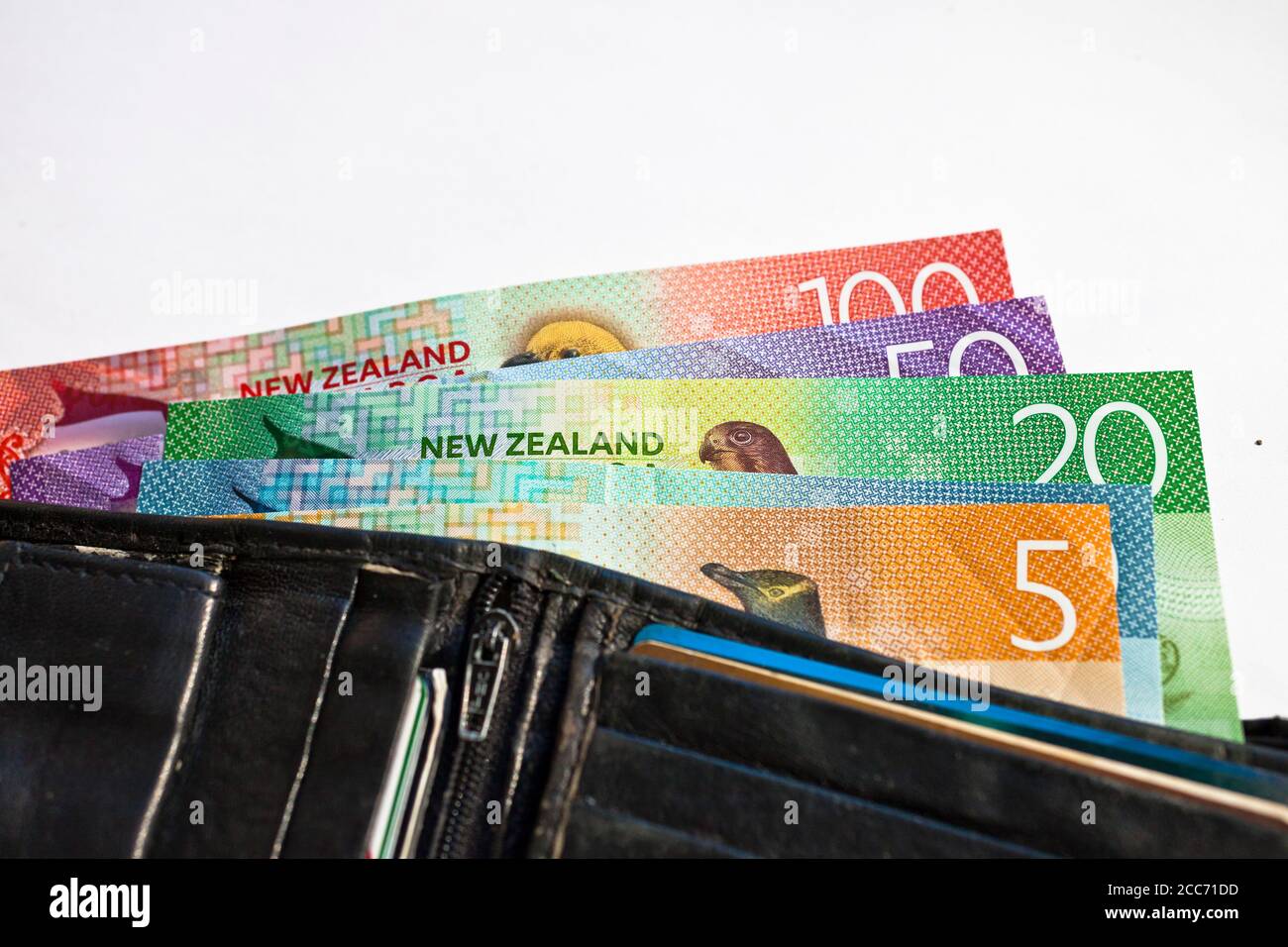 New Zealand cash, money or currency fanned out in someones wallet Stock Photo