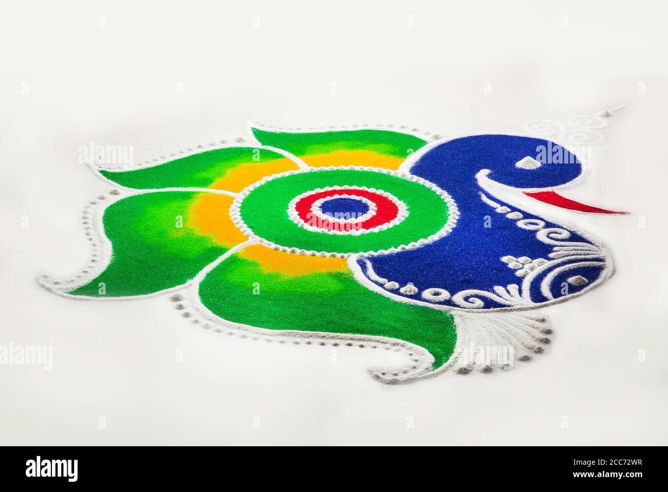 Rangoli Design is an art form made during using powder colours during  Diwali, Onam, Pongal, Hindu festivals in India Stock Photo - Alamy