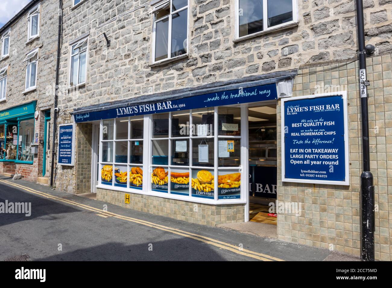 Front of Lyme's Fish Bar, a fish & chip shop in Lyme Regis, a popular seaside town holiday resort on the Jurassic Coast in Dorset, south-west England Stock Photo