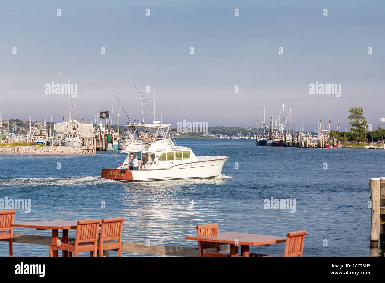 private fishing boat coming into the docks in Montauk, NY Stock Photo