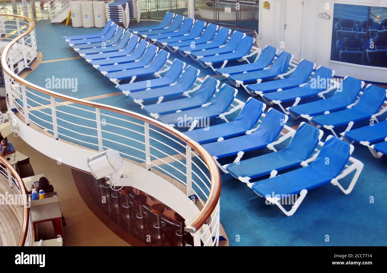 Empty deck chairs on a cruise ship Stock Photo - Alamy