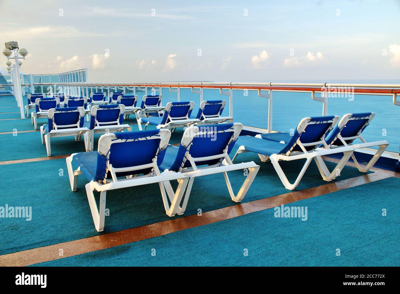Empty deck chairs on a cruise ship Stock Photo - Alamy