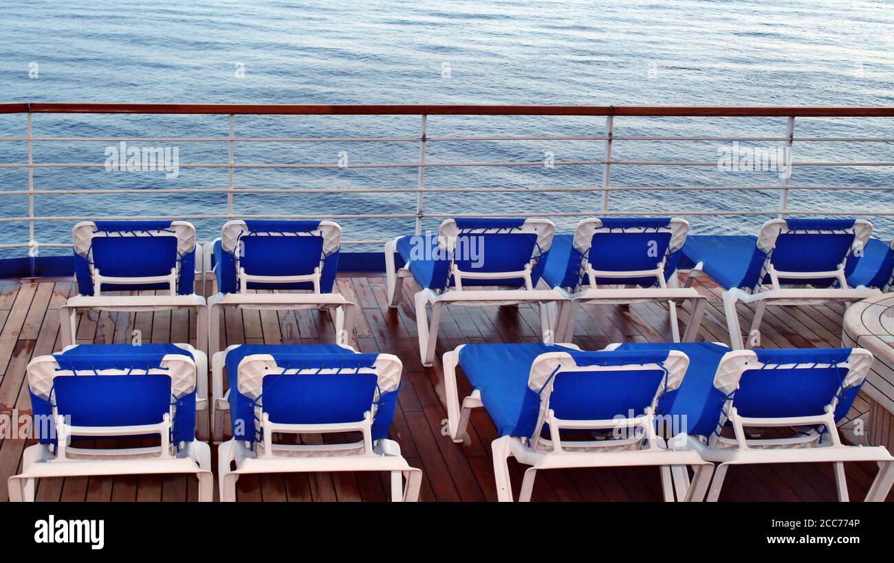 Empty deck chairs on a cruise ship Stock Photo - Alamy