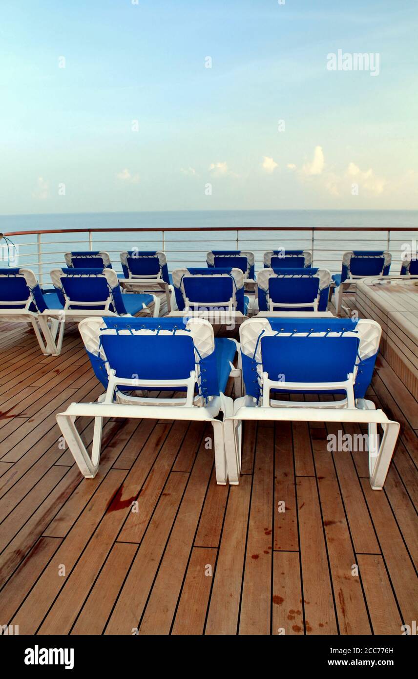 Empty deck chairs on a cruise ship Stock Photo - Alamy