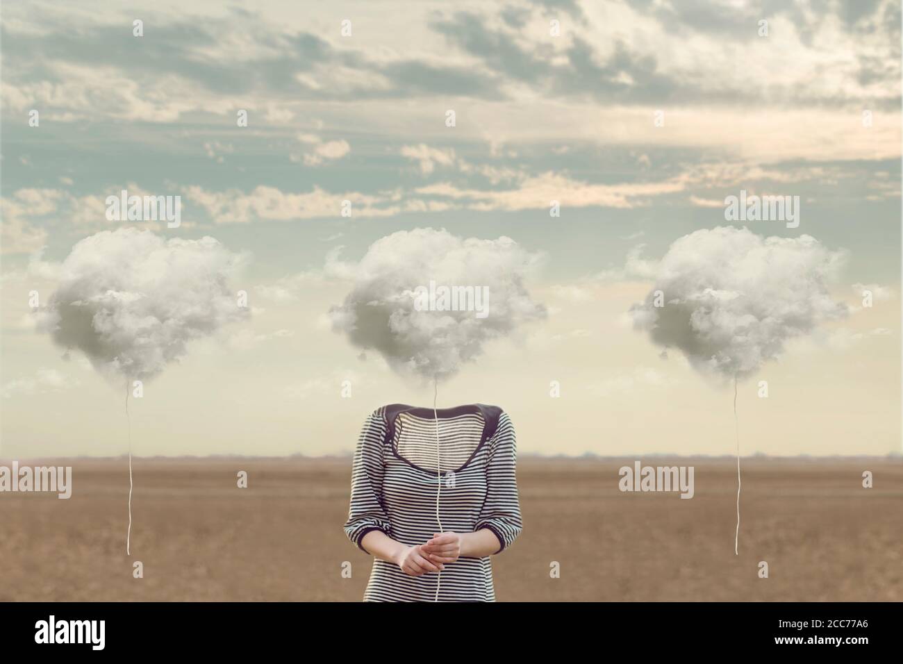 woman chooses her cloud to hide his face Stock Photo