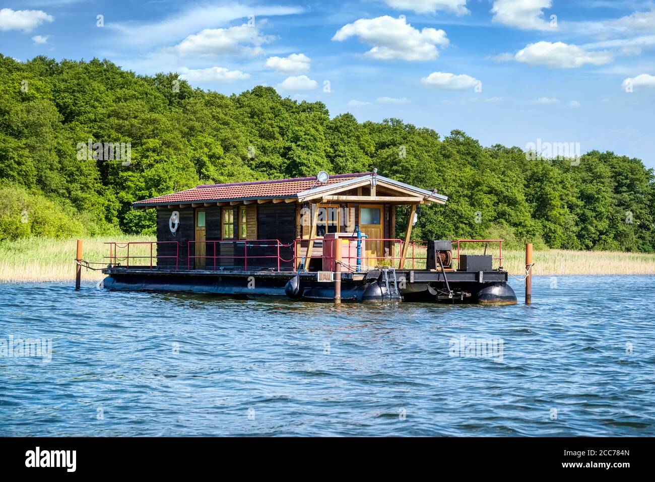 Houseboat on the Grienericksee in RheinsbergBrandenburg, Germany Stock