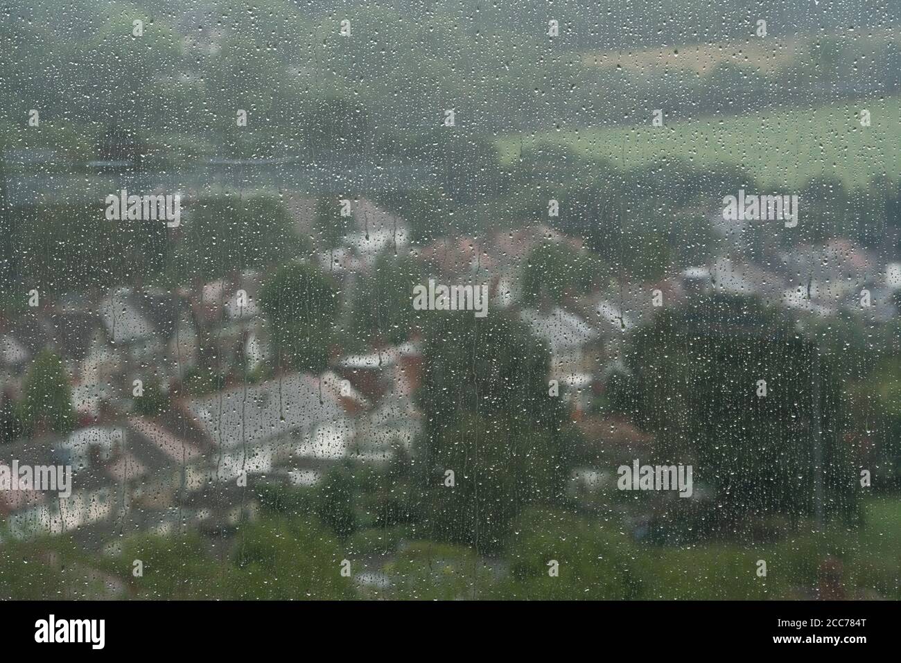 raindrops on a glass window pane Stock Photo