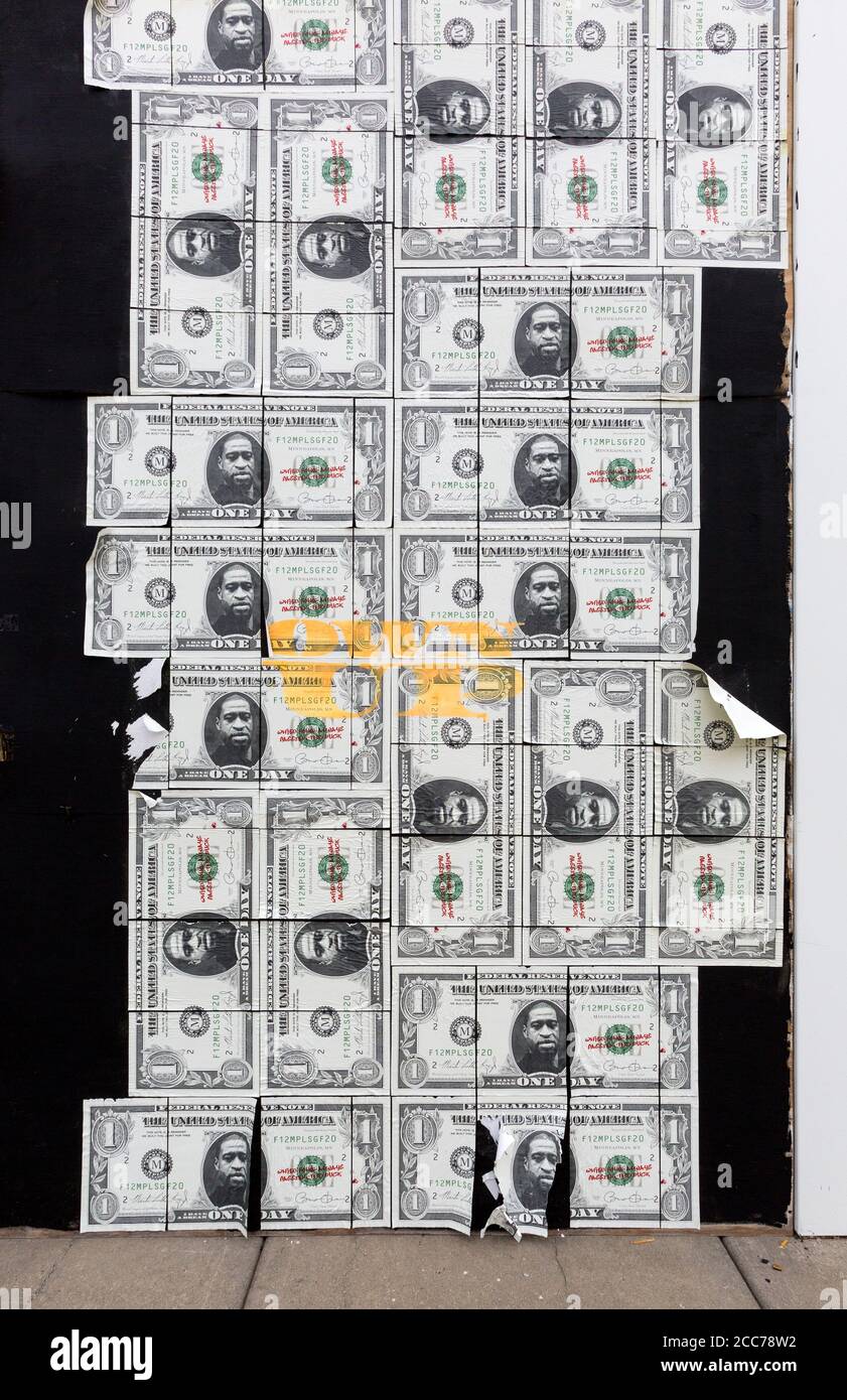 George Floyd portrait on a series of larger-than-life US one dollar bills on a boarded-up store on Hennepin Avenue in Minneapolis, Minnesota.  The dol Stock Photo