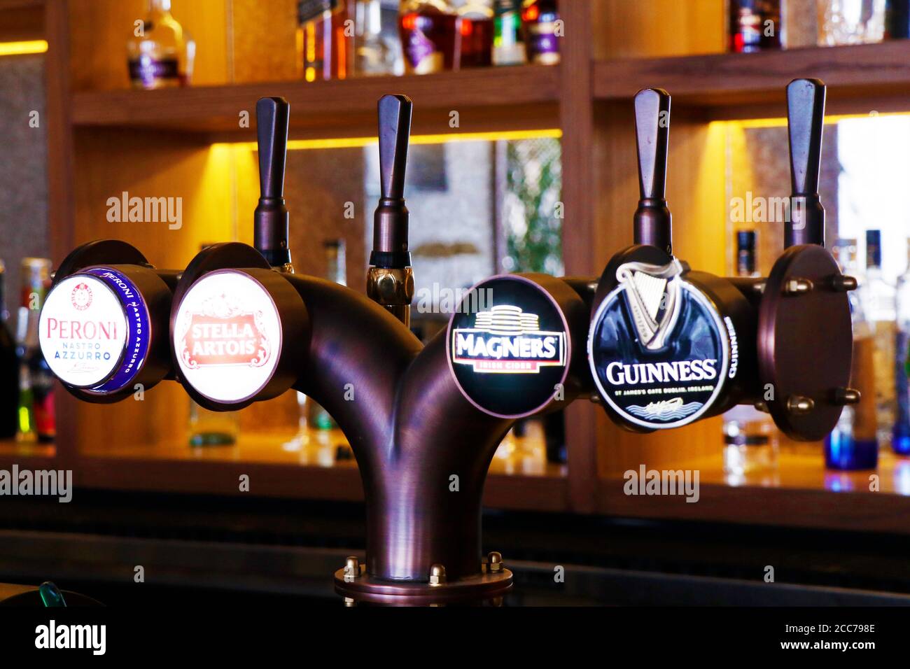 stainless steel draft beer dispenser in a bar counter Stock Photo Alamy