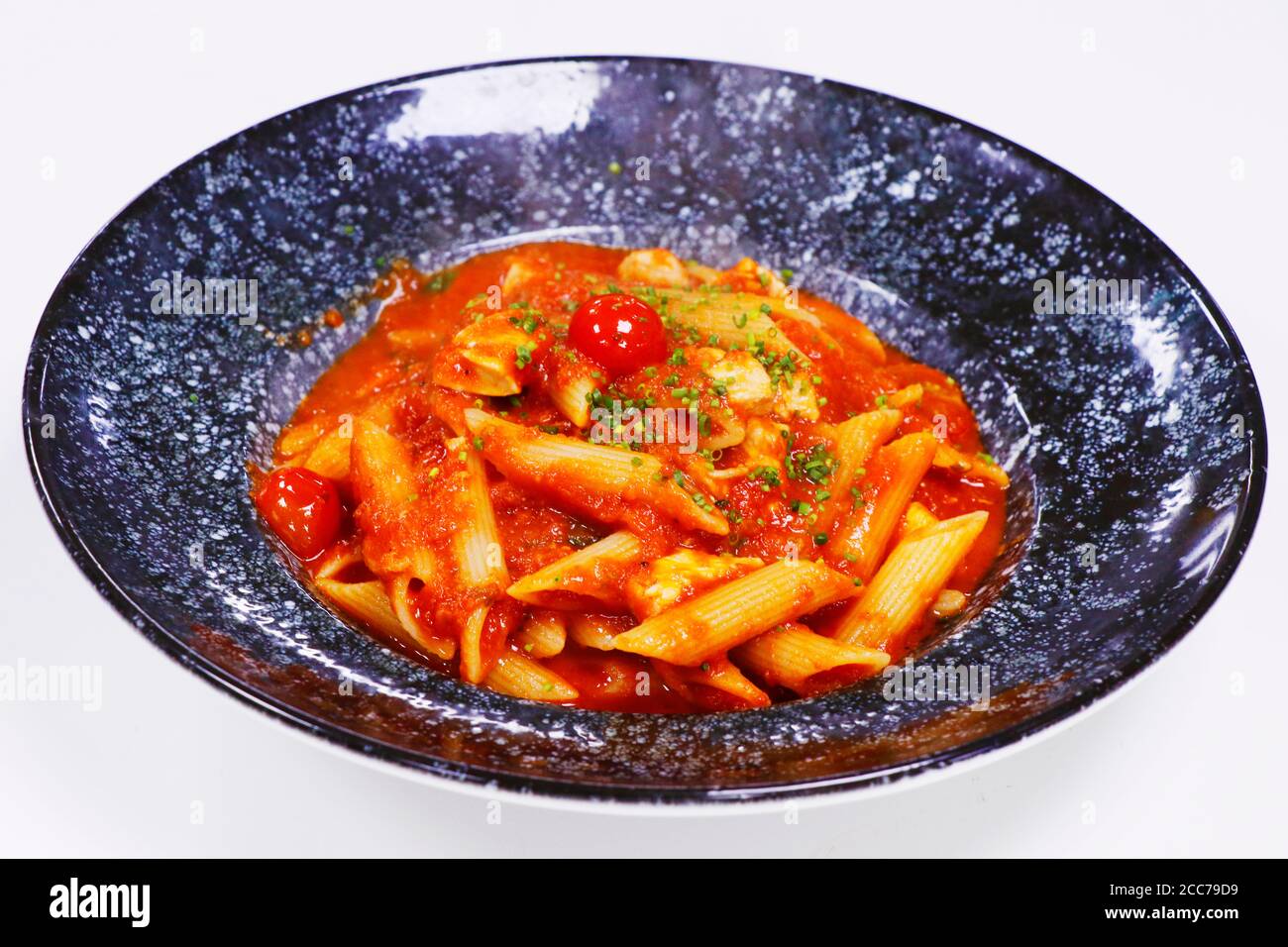 penne pasta with rich tomato sauce, penne arrabiata Stock Photo