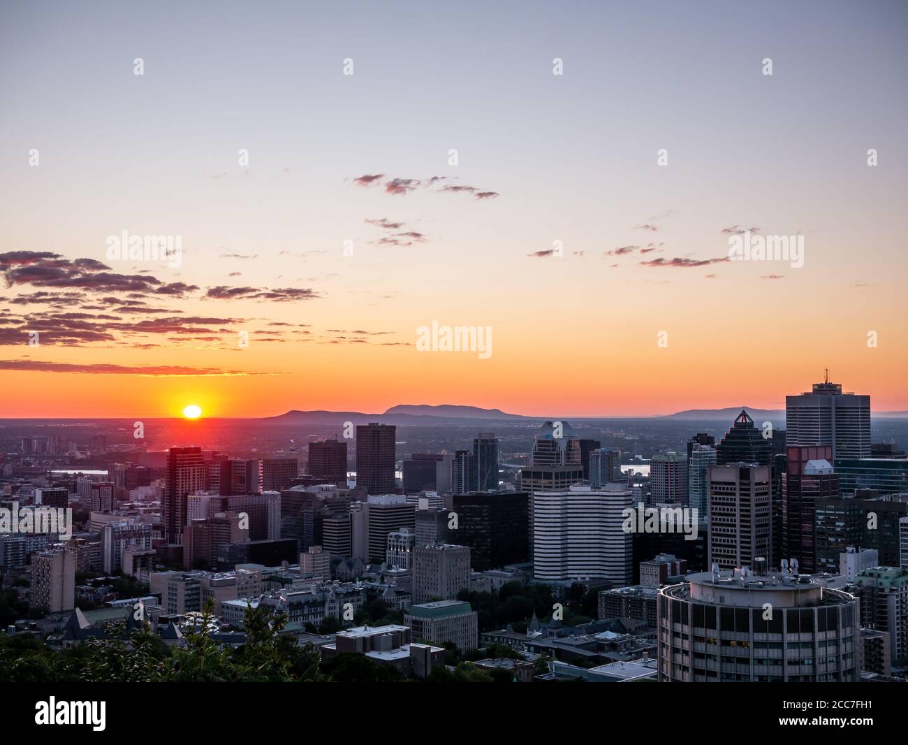 Montreal sunrise viewed from Mount Royal with city skyline in the morning Stock Photo