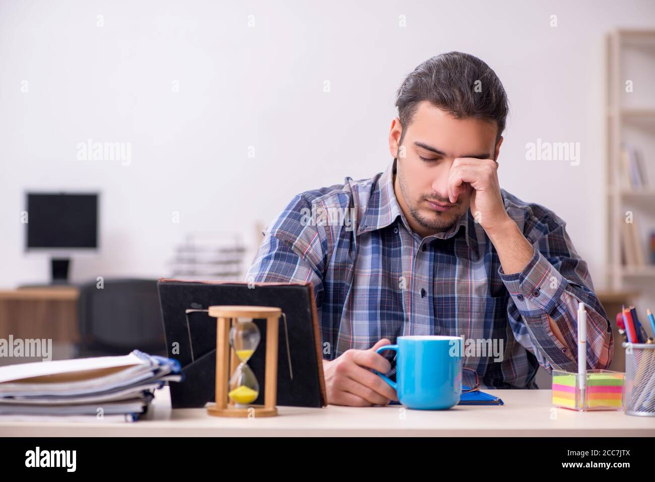 Young student sitting in the classroom Stock Photo