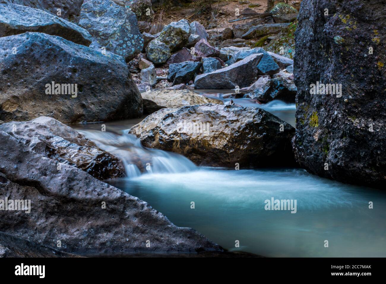 Blueish waterffall in a river Stock Photo