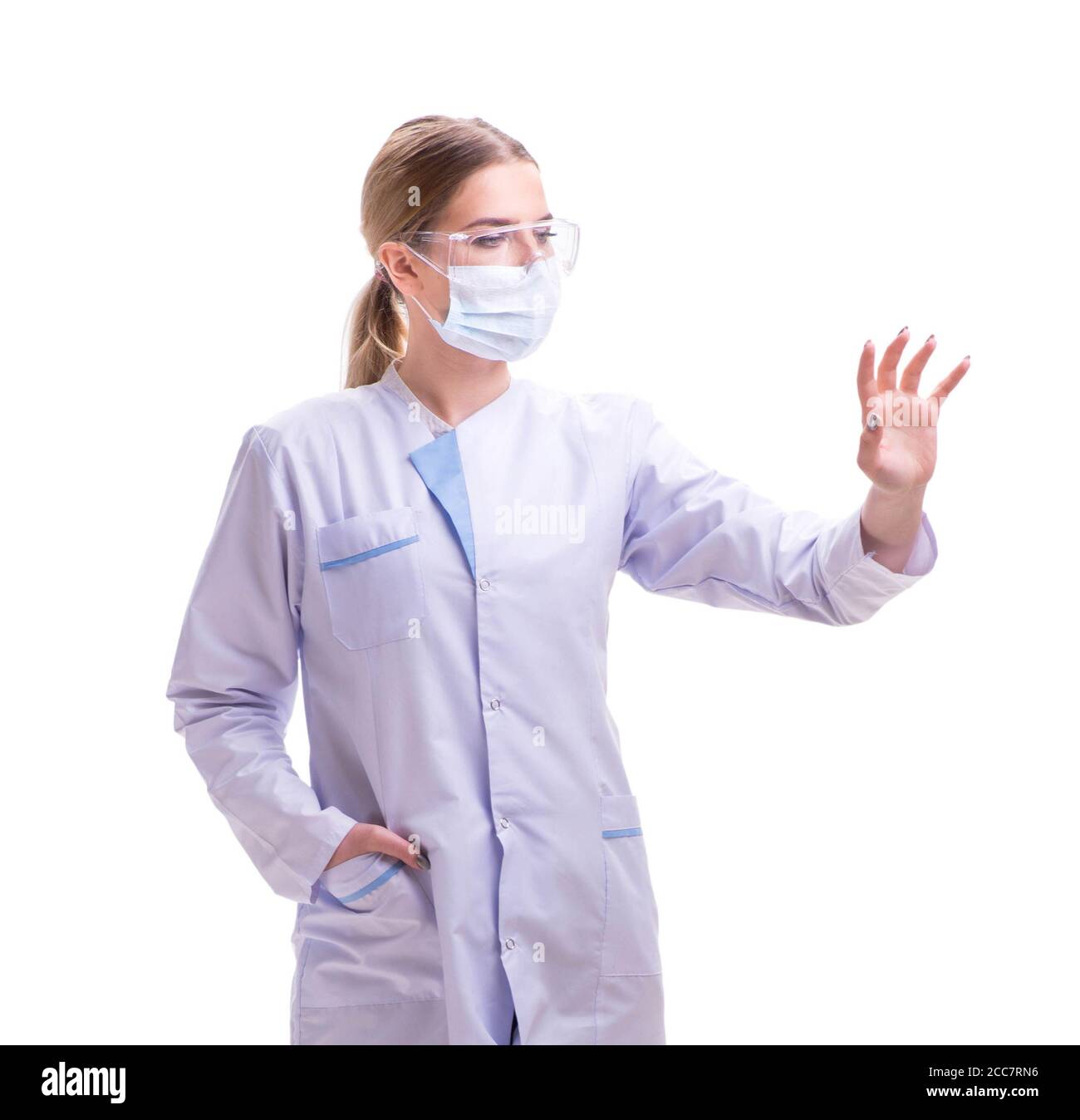 The young woman doctor isolated on white background Stock Photo - Alamy