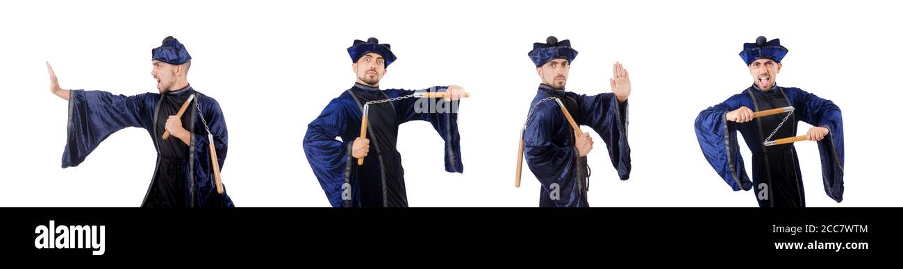 The martial arts master with nunchucks on white Stock Photo